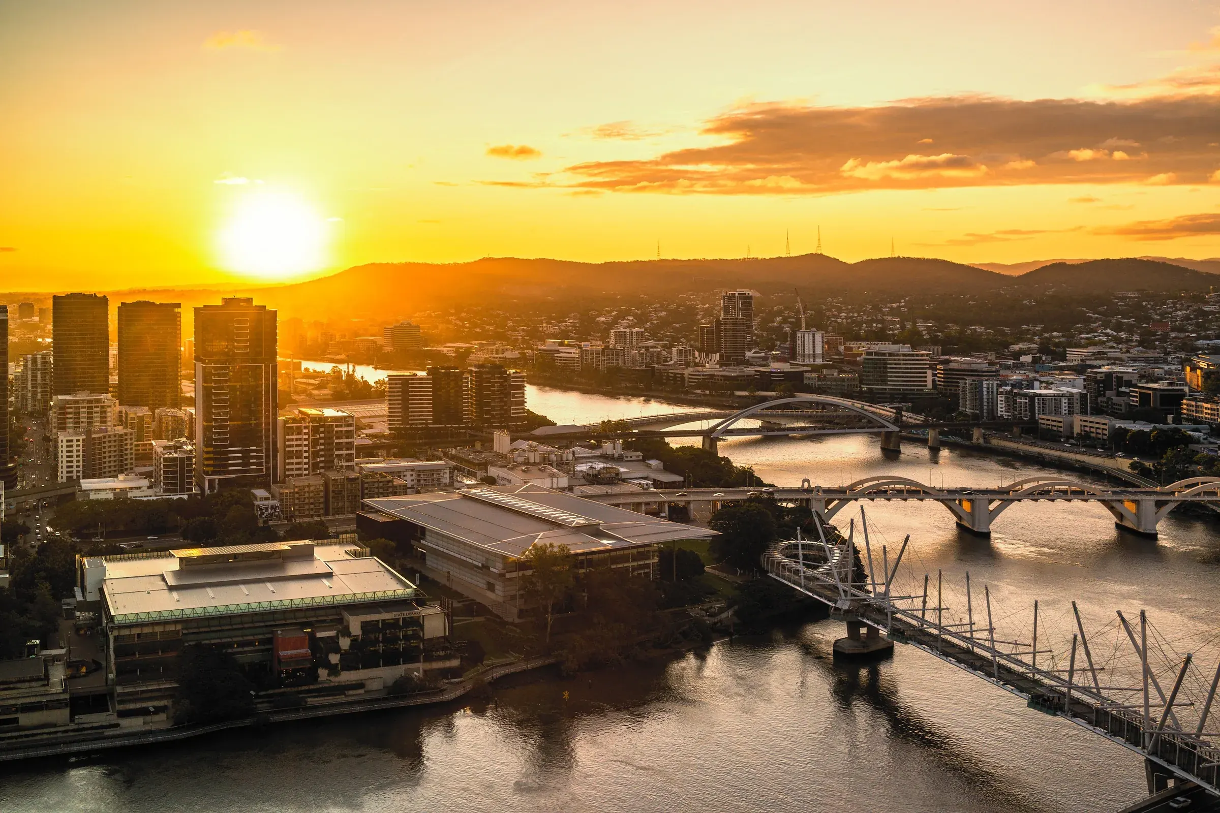 The Brisbane River and the city bridges at sunset